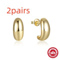 A pair of simple C-shaped ring stud earrings in 925 sterling silver, shown in both gold and silver colour options.