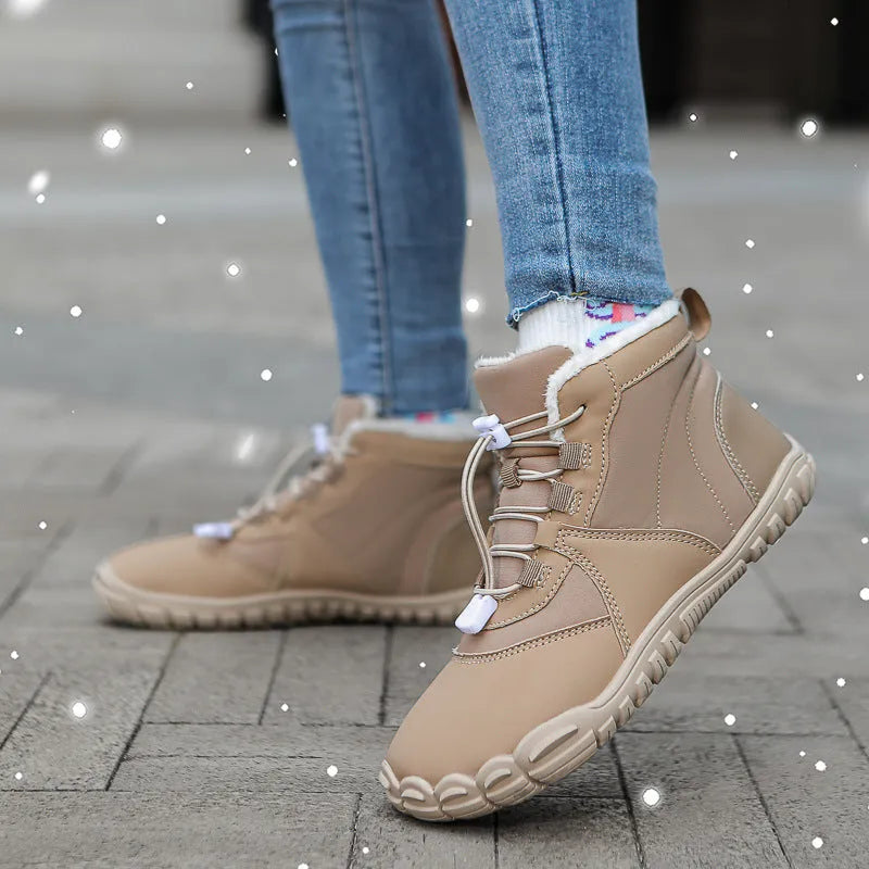 Waterproof unisex snow boots with lace-up front, fleece lining, and rubber sole in black, khaki, or pink.