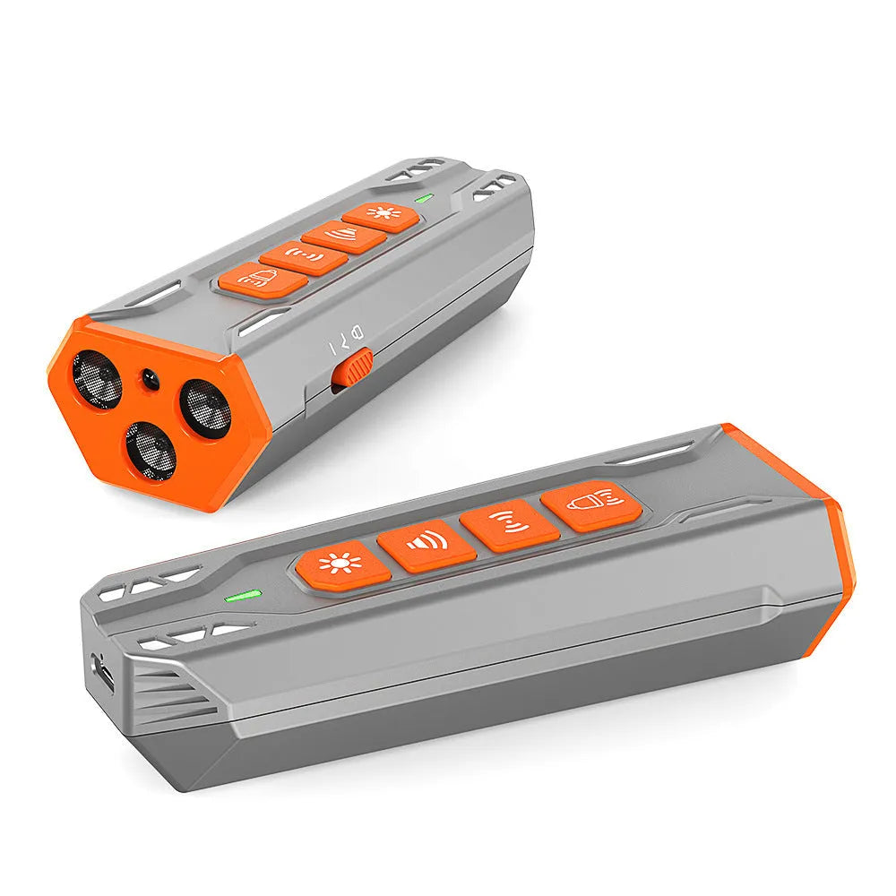 Three-head ultrasonic dog trainer in black and orange colour on a grey background.