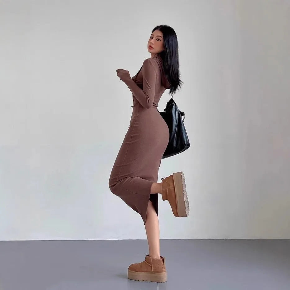 Women's light grey hooded long sleeve sheath dress with high waist on a model