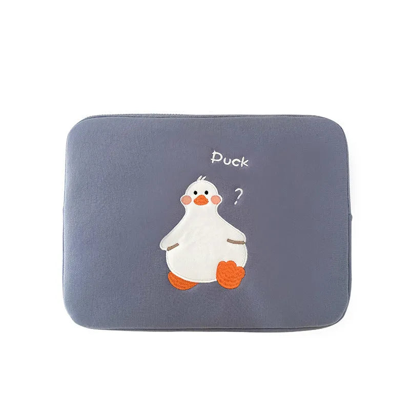 Blue cotton tablet case with cartoon duck embroidery and a zipper, shown next to a green version.