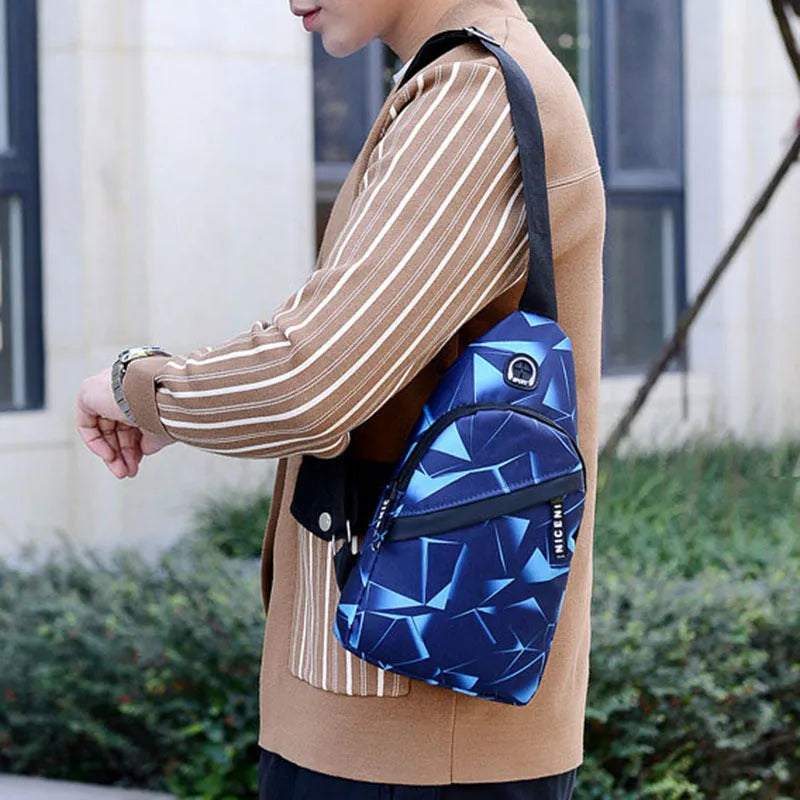 Men's blue oxford cloth sling chest bag with earphone hole and adjustable shoulder strap