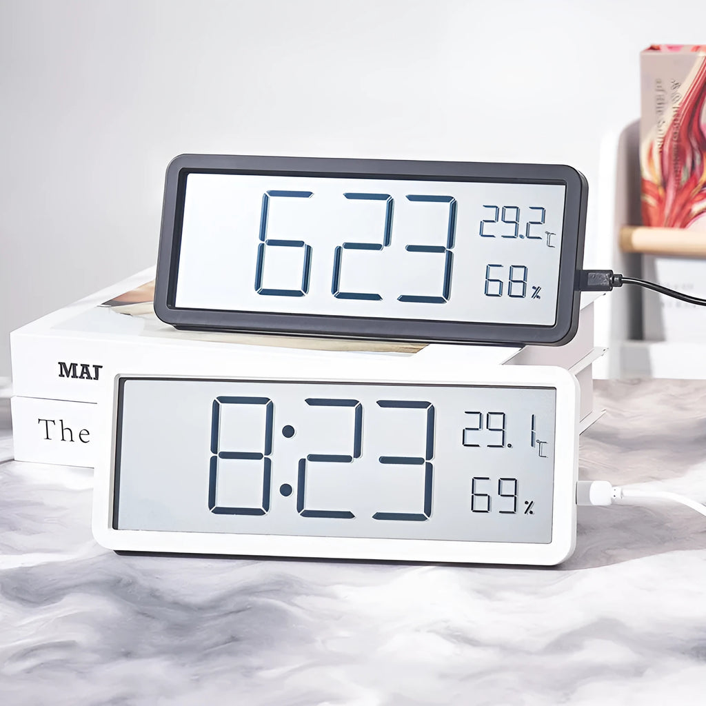 Simple large screen temperature and humidity clock with plastic shell in white Nordic style on a desk