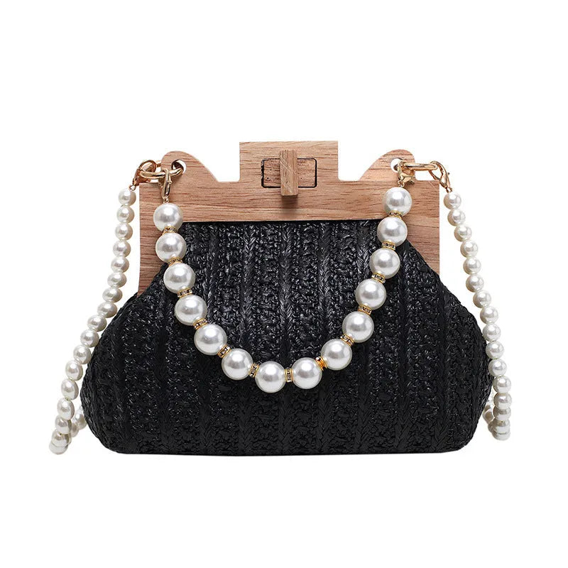 Women's straw woven shoulder bag with pearl chain detail in horizontal square shape