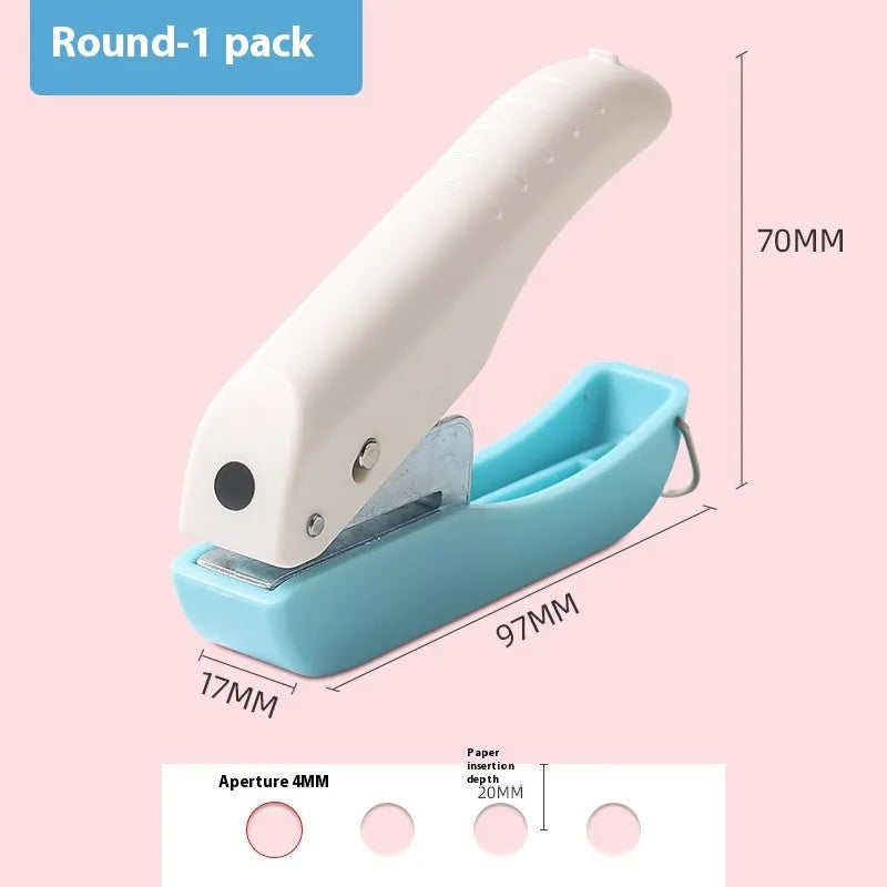 Manual handheld craft punching machine with love, star, and round dies for children's paper projects.