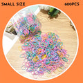 Multi-colour TPU baby hair elastic bands spilling from a reusable container.