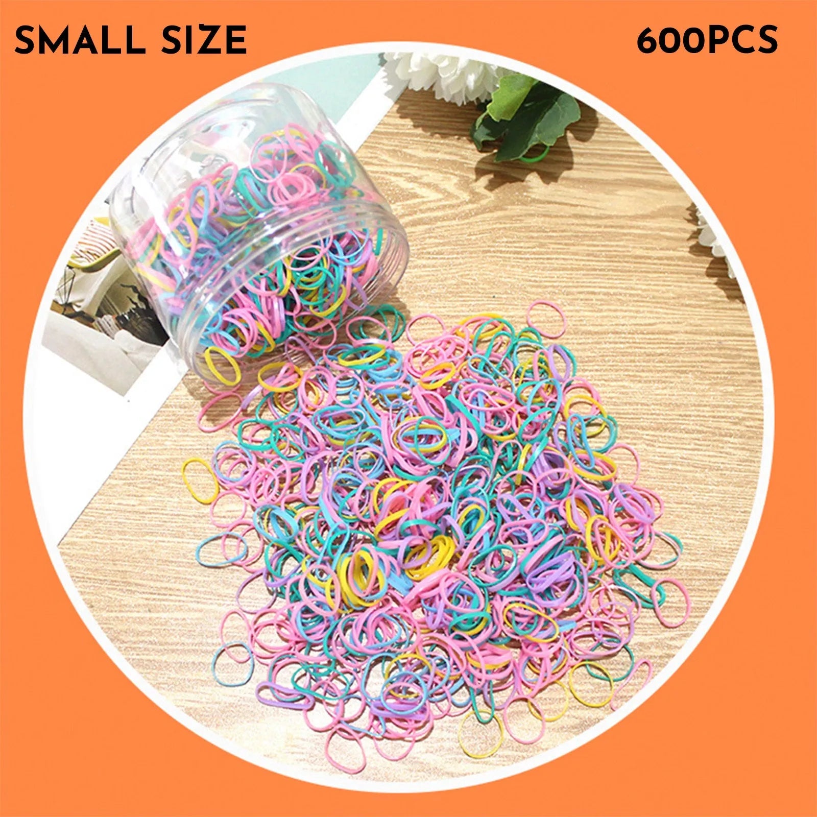 Multi-colour TPU baby hair elastic bands spilling from a reusable container.