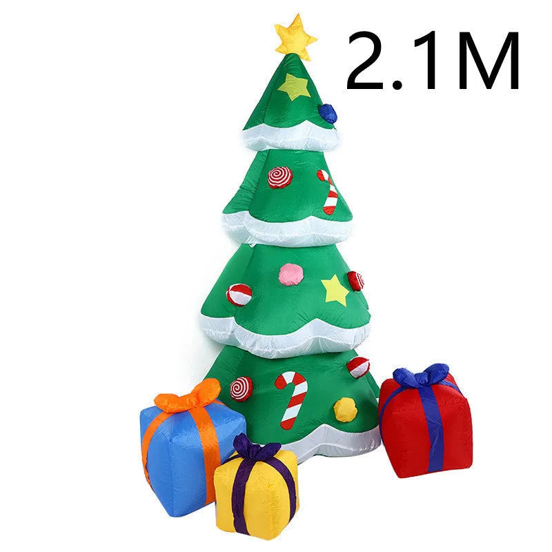 Christmas LED inflatable decoration of a glowing Santa Claus figure in a garden at night