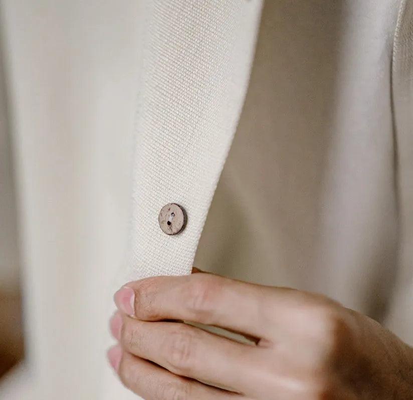 Light apricot coloured men's shirt with a bamboo and floral pattern and a Cuban collar.