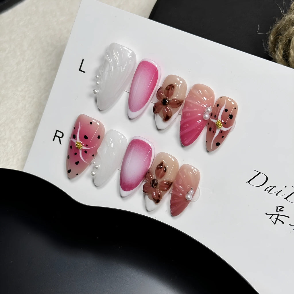Hand-painted 3D carved nail art patches in embossed candy colours for almond-shaped nails.