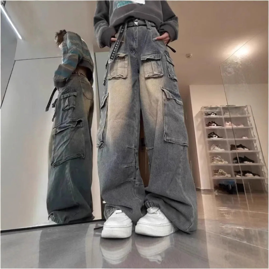 Men's loose fit straight leg distressed jeans with multiple pockets in light blue or black wash