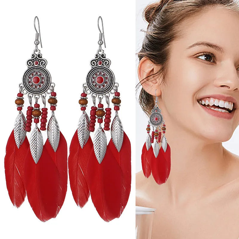Round drop feather earrings with leaf design in alloy, showing electroplated finish in one of thirteen available colours.