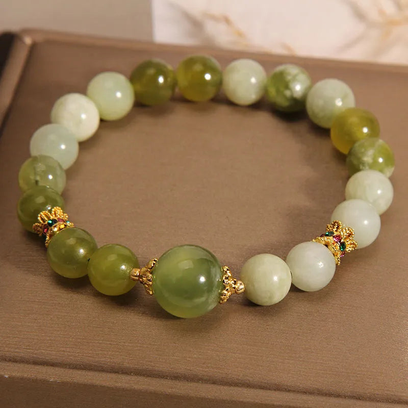 Women's bracelet made from green Xiuyan jade in a light luxury sweet Mori style.