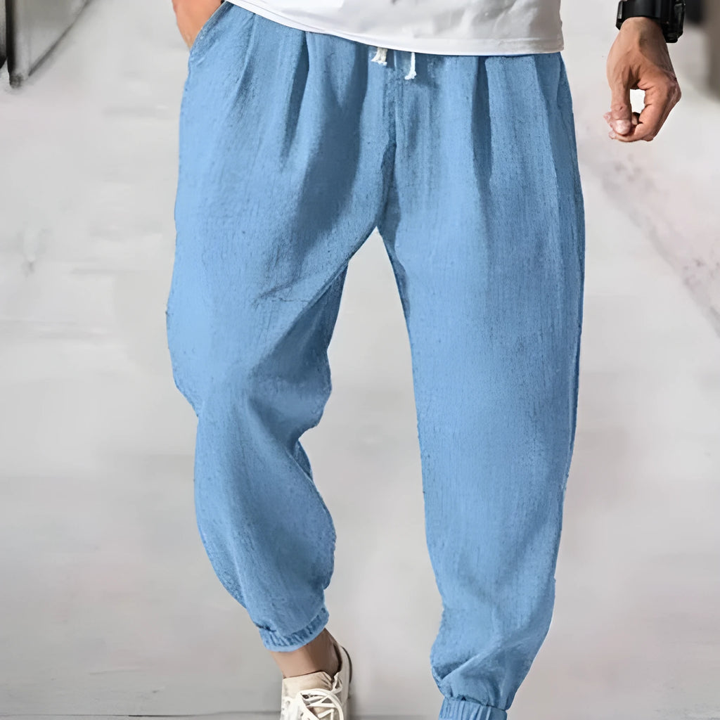 Men's loose fit cotton ankle banded casual pants in light green colour