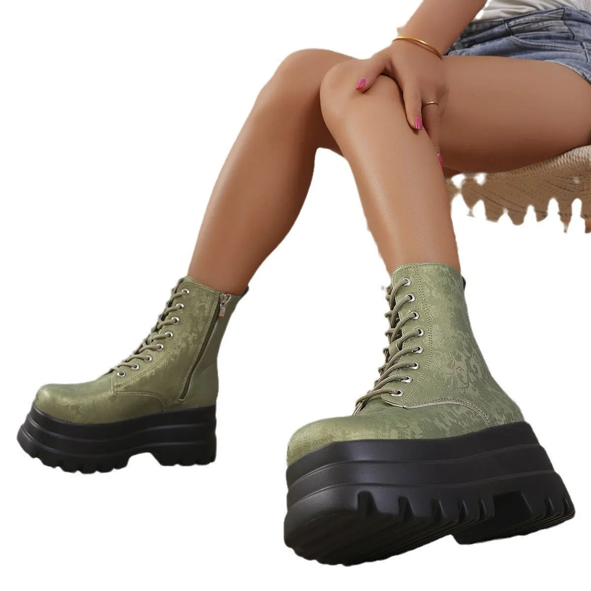 Women's black retro Martin boots with chunky heel, platform sole, and side zip.