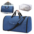 Dark blue folding duffel bag with handles, suitable for travel and gym use.
