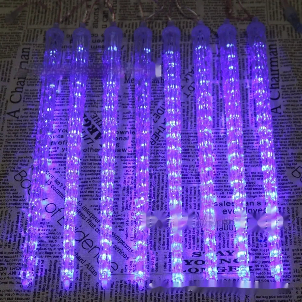 Solar-powered LED ice cone meteor shower festoon lamp with remote control on a bracket.