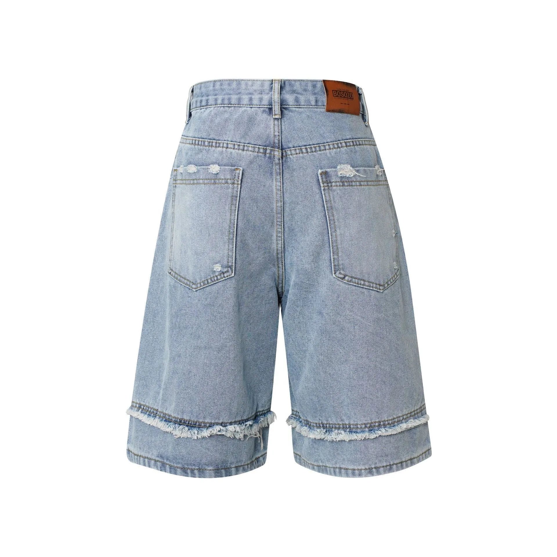 Straight cut denim shorts with distressed raw edge detailing in black, dark blue, and light blue colours