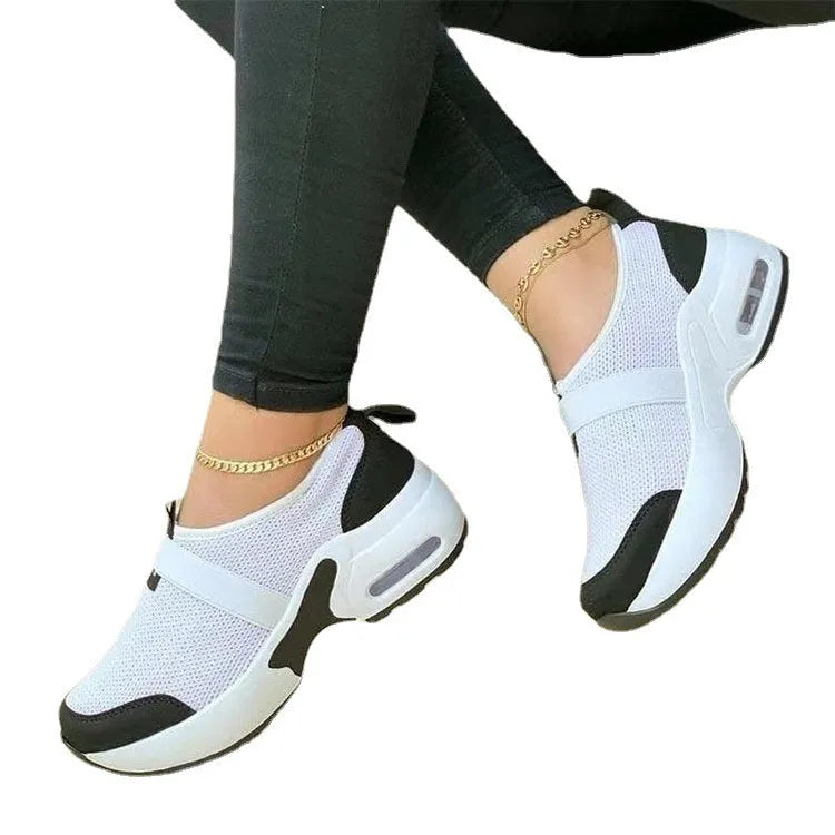 Women's lightweight flat mesh sneakers in multiple colours with a rubber sole, shown from the side.
