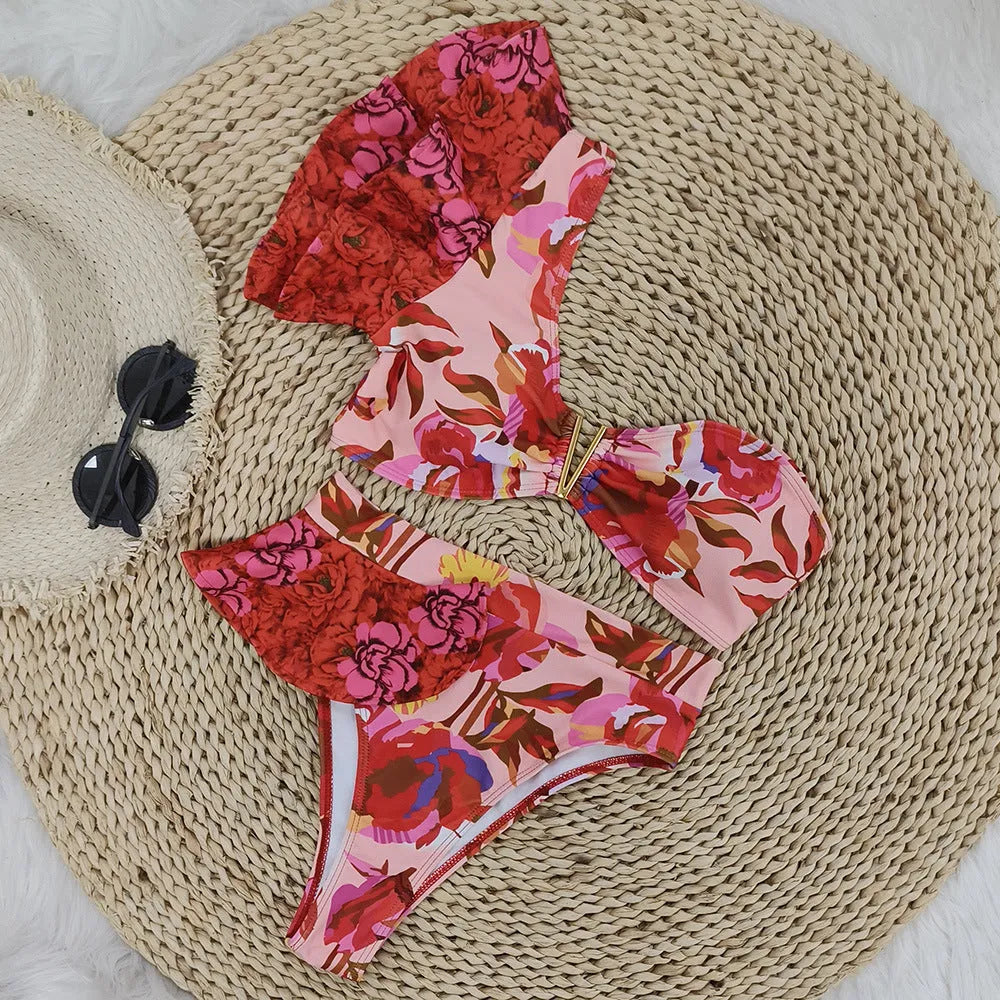 Women's pink floral print one-shoulder bikini with ruffled detail and high-waist briefs