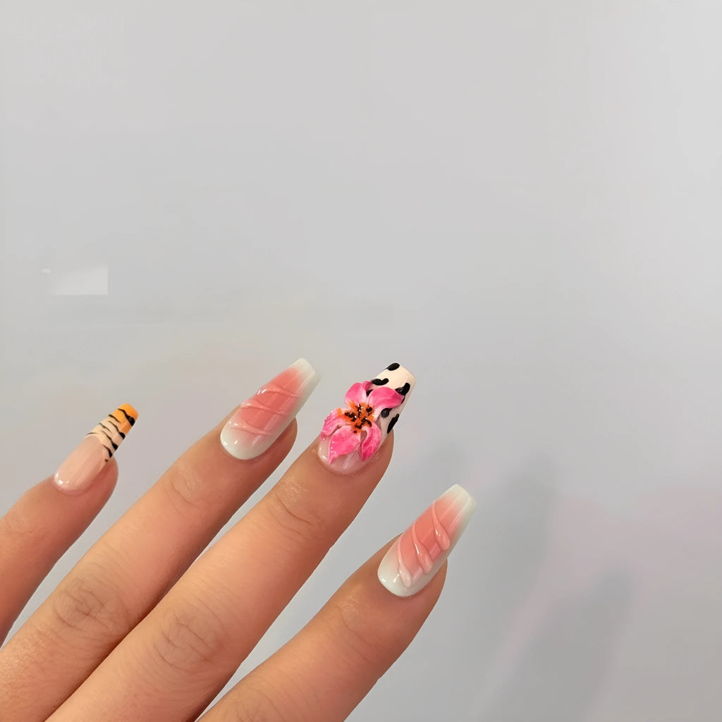 Zebra pattern lily hand carving nail art set with embossed flower and leopard print designs.