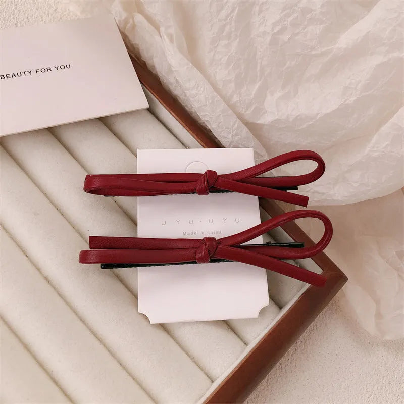 Wine red leather bow hair barrettes with manual processing and advanced styling for women