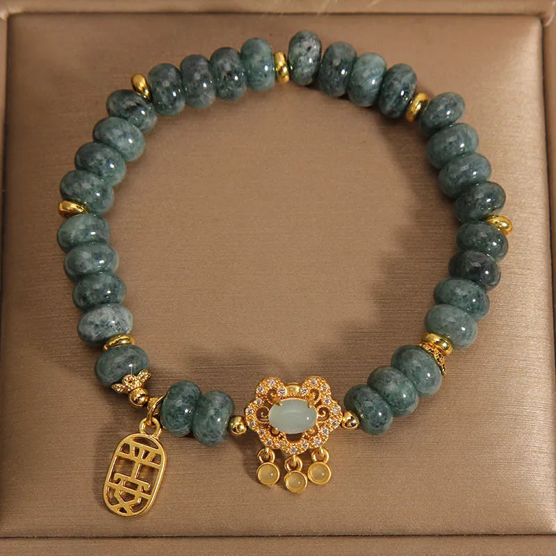 Women's natural emerald jade bracelet with abacus beads design and alloy safety lock clasp