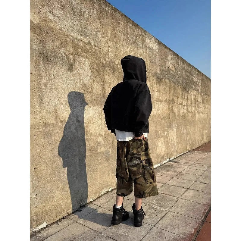 Men's camouflage cropped jeans with retro patch and ripped detailing in straight-leg loose fit