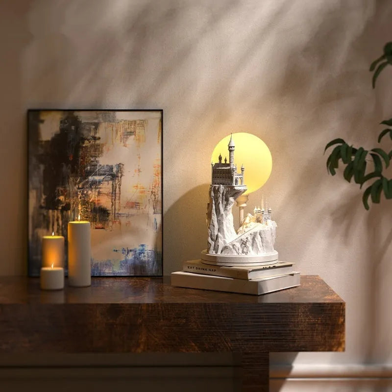 White composite gypsum table lamp with cable and switch on a surface.