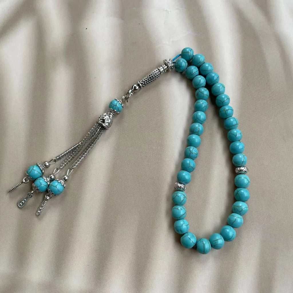Sky blue stone Muslim prayer bracelet with 8mm spherical beads on wrist