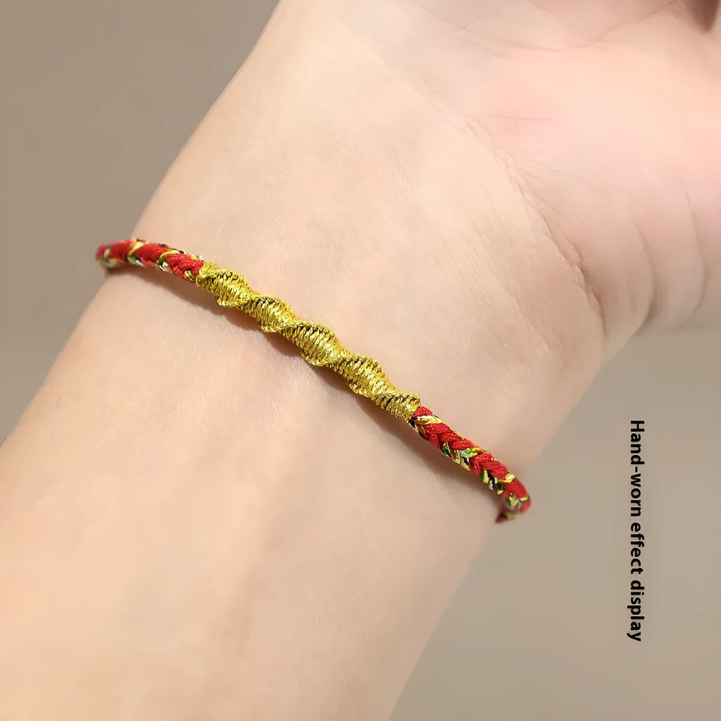 Adjustable eight-strand woven hand strap in multiple zodiac-inspired colours, showing the sliding length adjuster.