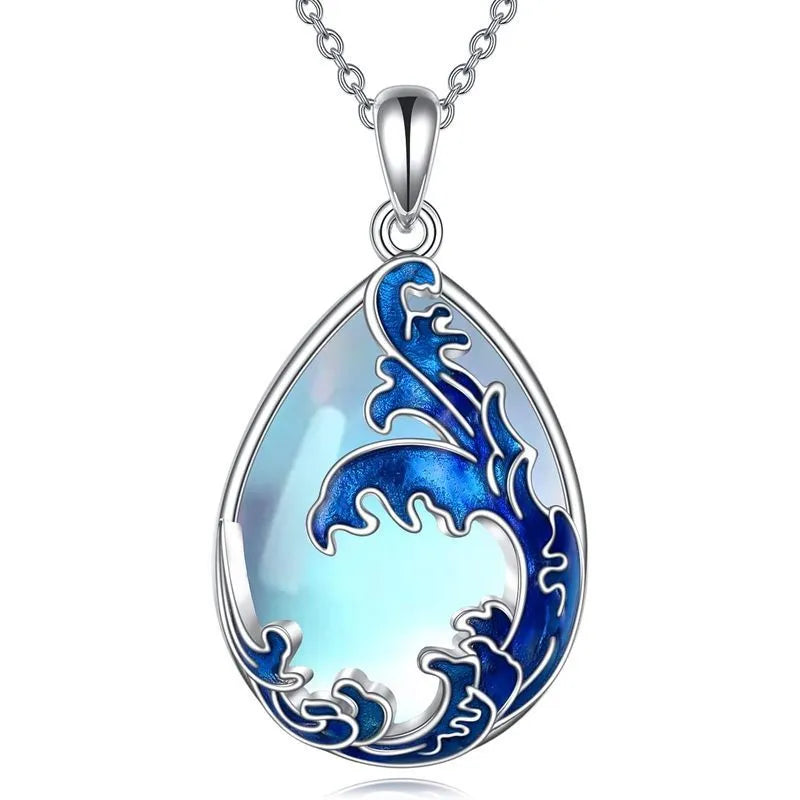 Blue heart-shaped alloy pendant necklace on a chain.