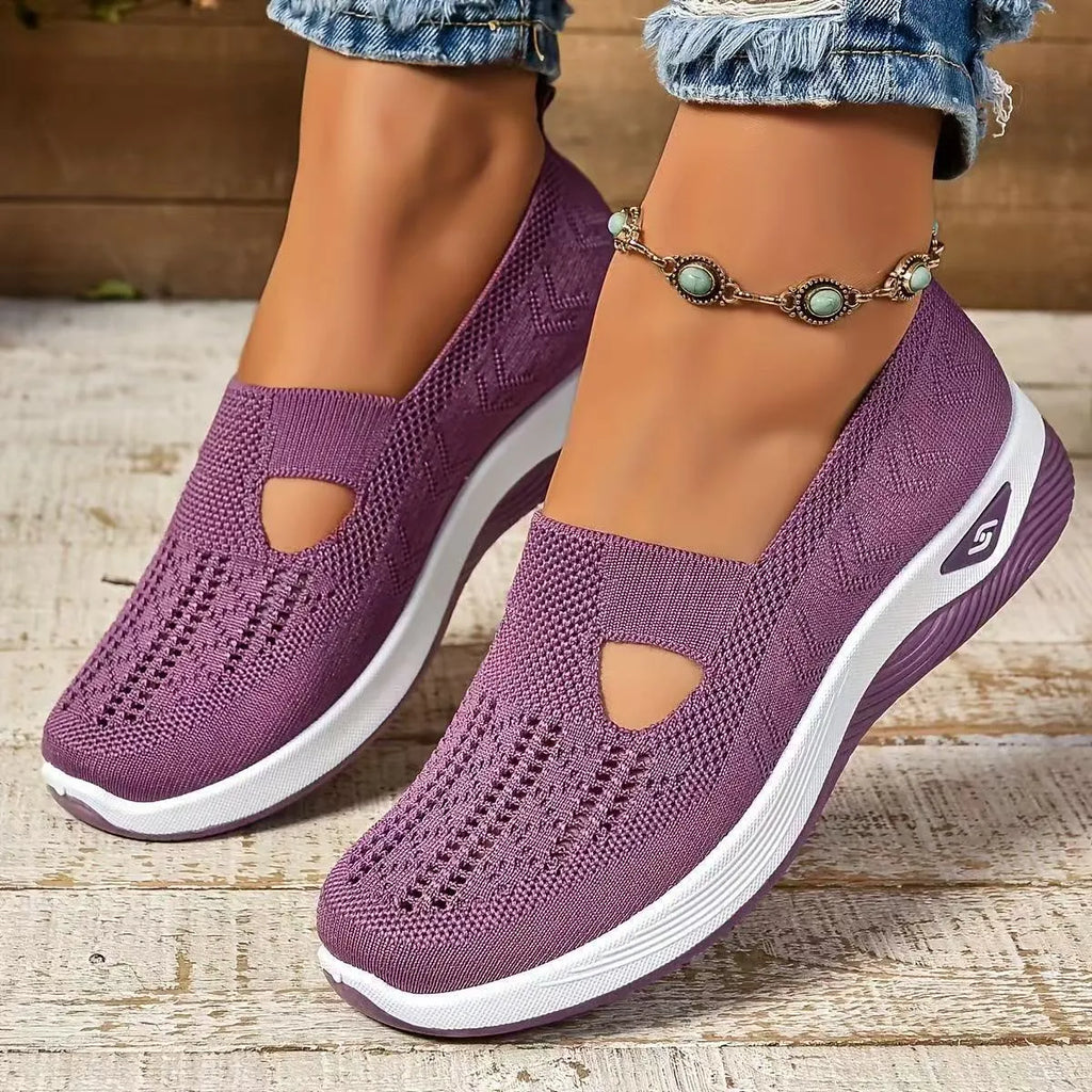 Women's low-top mesh casual shoes with a T-strap, flat heel, and round toe in various colours.