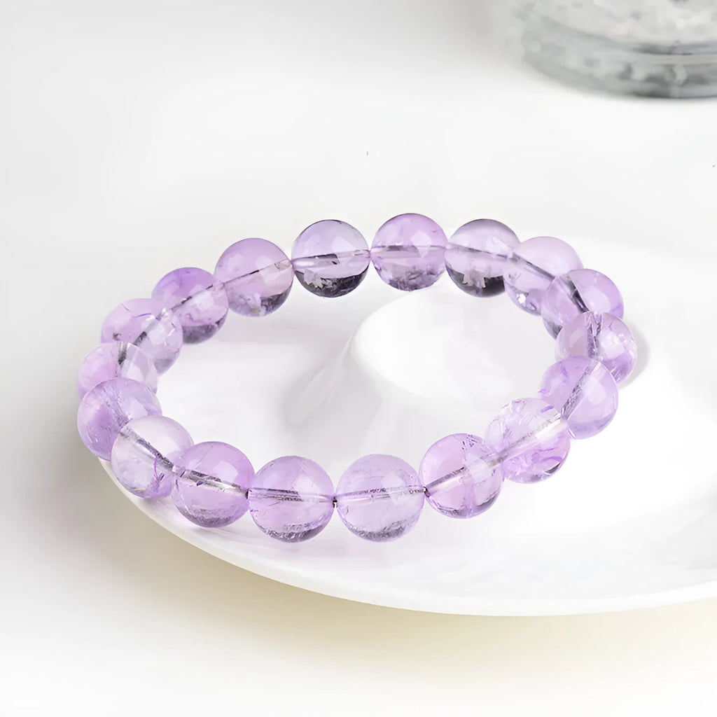 Lavender amethyst water ripple bracelet with round beads in various sizes from 6mm to 17.8mm