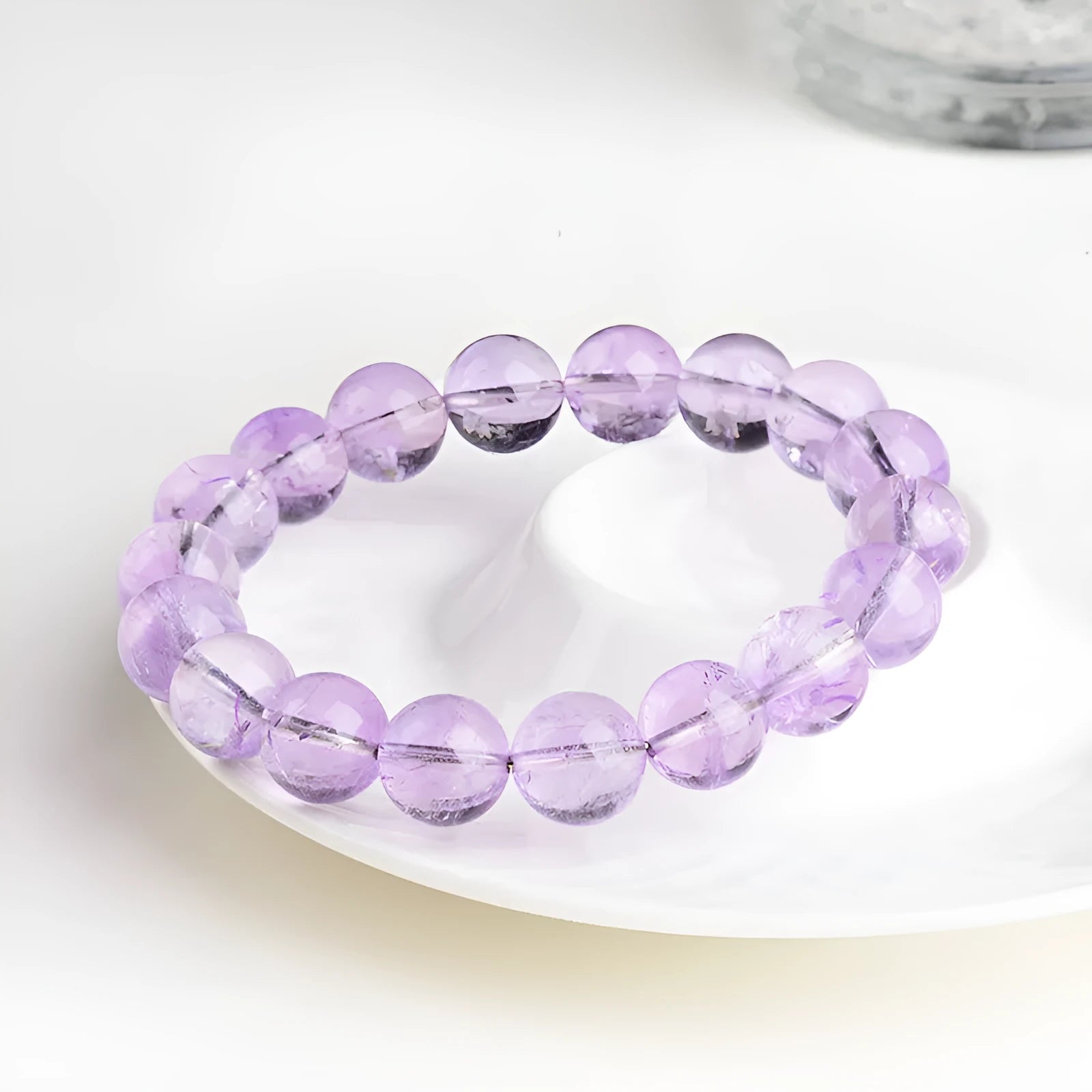 Lavender amethyst water ripple bracelet with round beads in various sizes from 6mm to 17.8mm