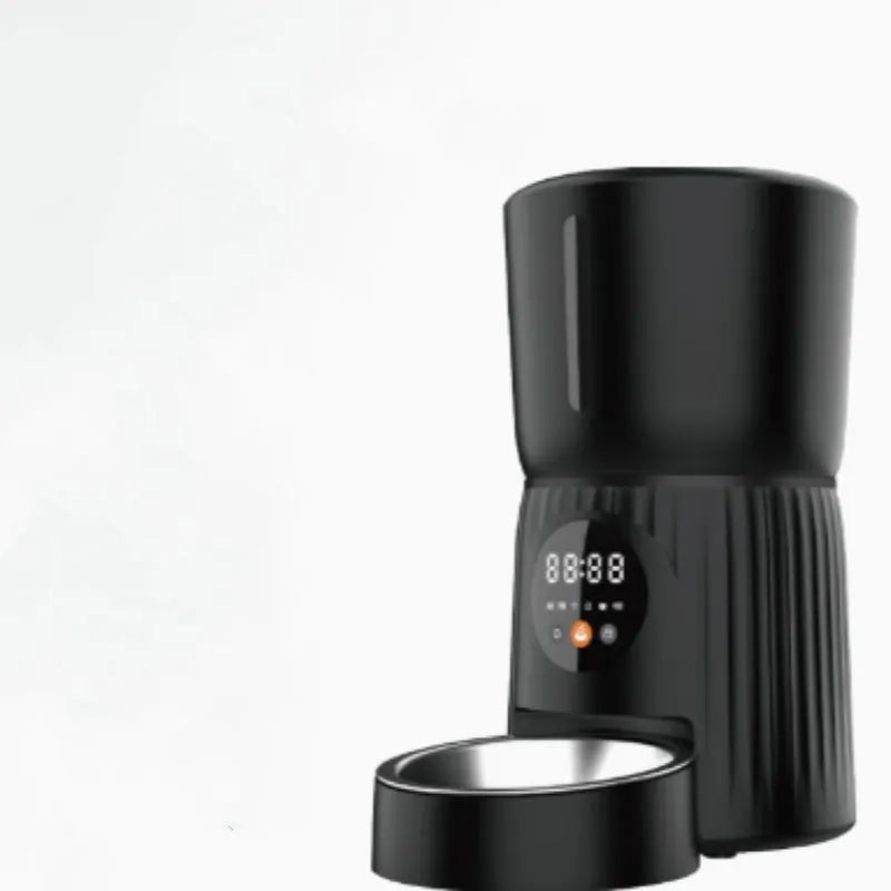 Black intelligent pet feeder with digital display showing feeding schedule