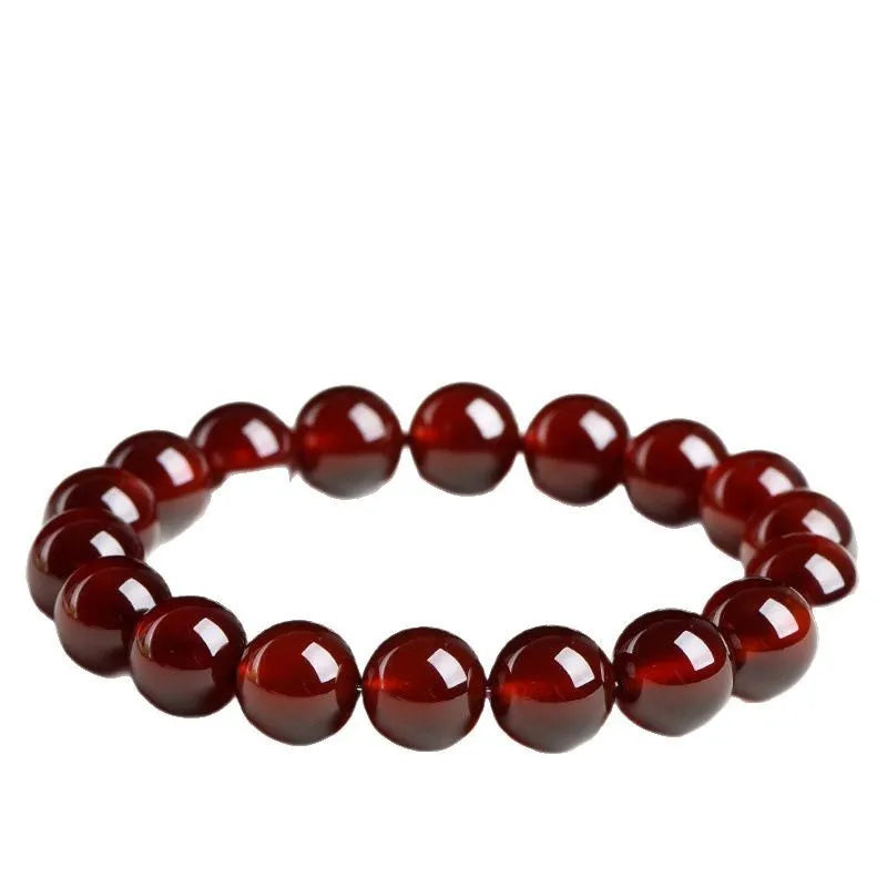 Natural orange red garnet ball bracelet with spherical crystal beads and traditional Ruyi decorative element