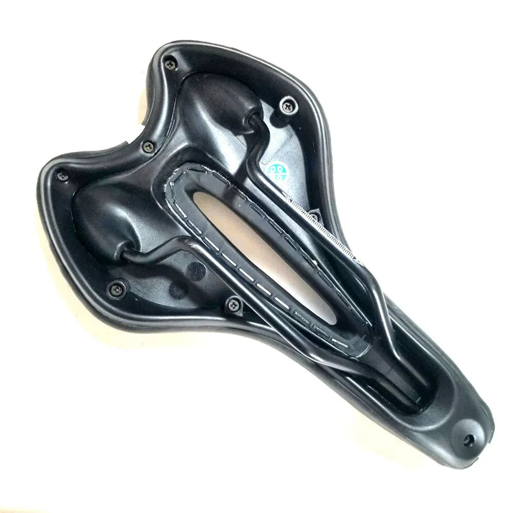 Bicycle saddle cushion with silicone padding and waterproof cover alongside wrench and patch kit