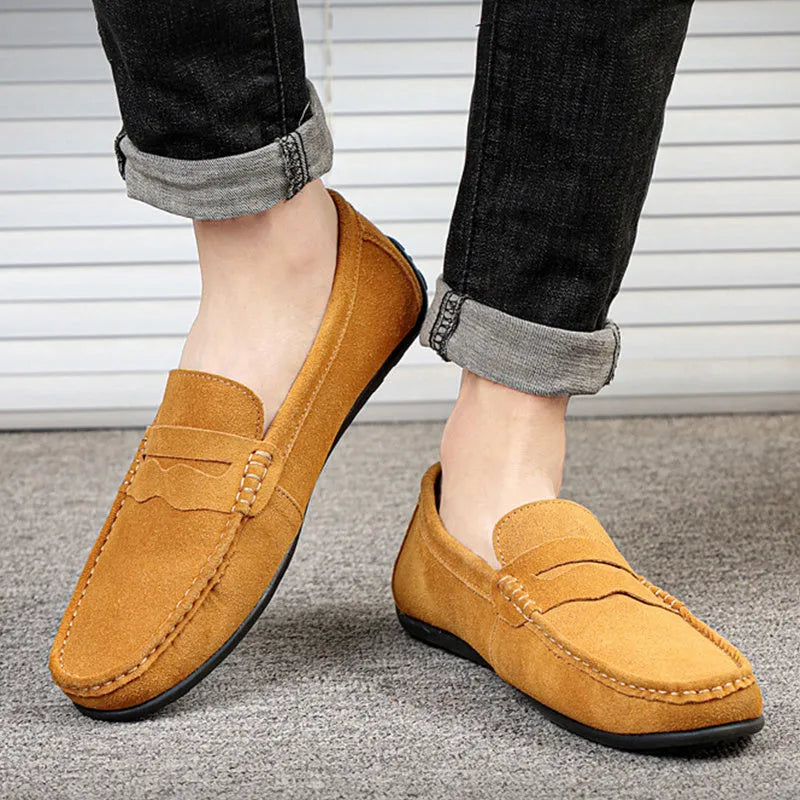 Men's solid colour suede loafers with a round toe and flat rubber sole