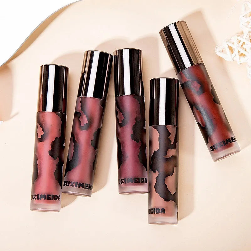 Matte liquid lipstick tube showing five colour options including orange brown coffee and jujube red