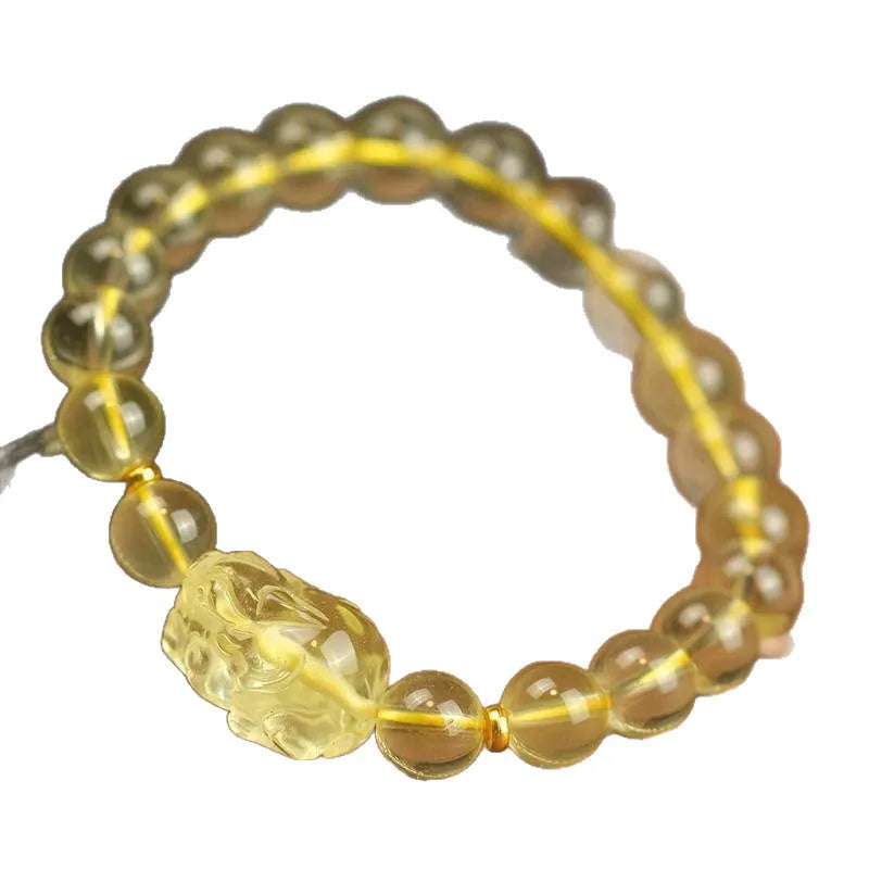 Yellow leather Citrine Pi Xiu bracelet with a clear artificial crystal charm in Chinese simple style.