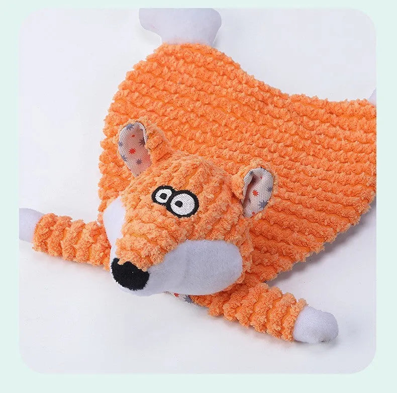Brown, grey, and orange velvet pet stuffed toys in fox and elephant designs with crinkle sound paper inside.