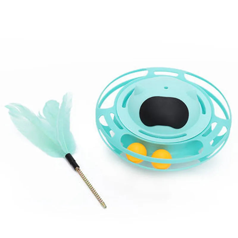 Pink cat tumbler turntable toy with self-hi feature for independent play