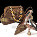 Women's pointed toe high heel stiletto shoes with matching small bag in synthetic leather