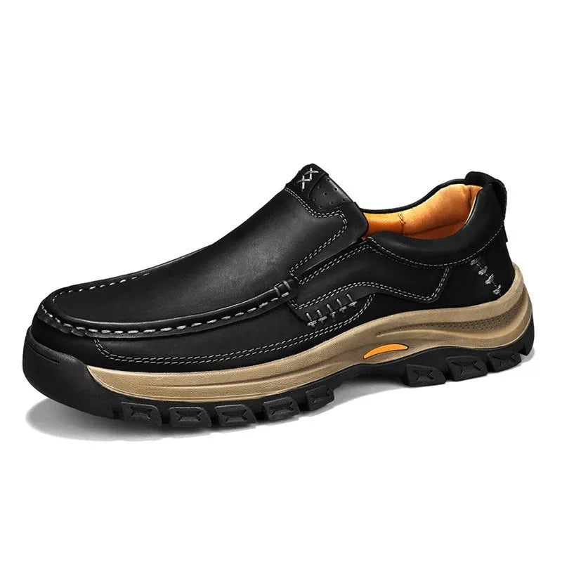 Men's black leather mountaineering shoes with thick rubber soles and round toe.