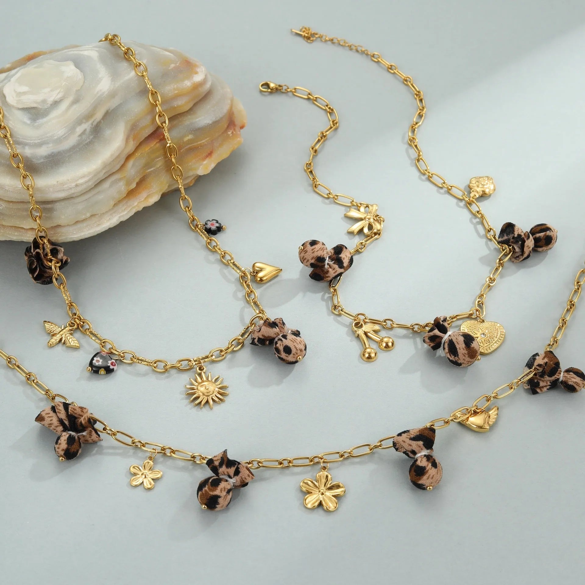Stainless steel necklace with leopard pendant and love heart flowers design on adjustable chain