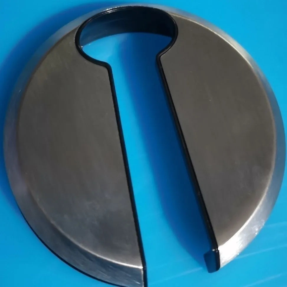 Stainless steel kitchen wine bottle opener tool on a countertop.