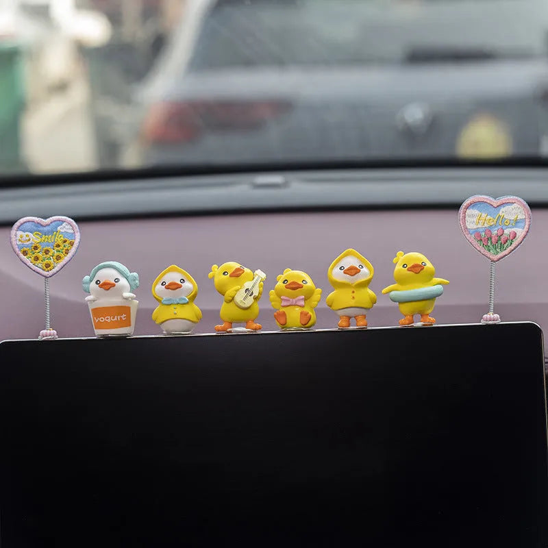 Cartoon duckling car decoration set with six PVC ducks and rectangular dashboard sign