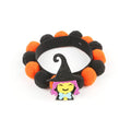 Halloween pet collar with decorative fur ball in pumpkin, skull, or witch style