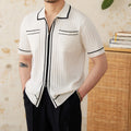 Men's black slim fit short sleeve polo shirt with lapel collar on hanger